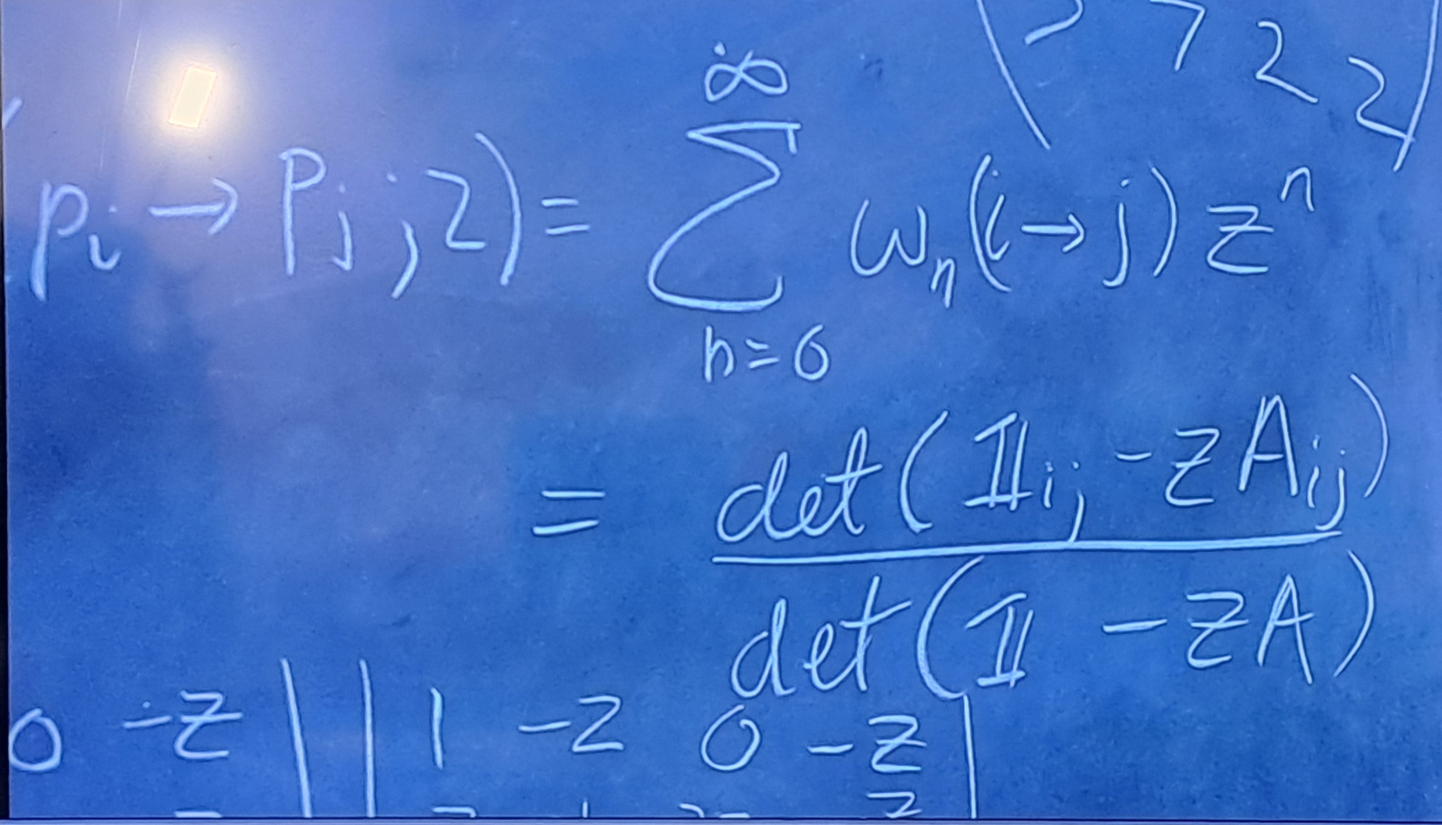 Detail of the solution board showing walk-count notation and a determinant expression.